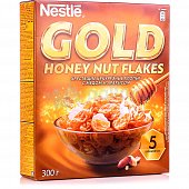 Сухой завтрак Nestle Gold 300г Кукурузные хлопья с медом и арахисом 1/16